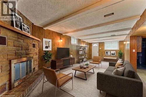 Recreation room is virtually staged - 21 Vicmount Drive, Kitchener, ON 