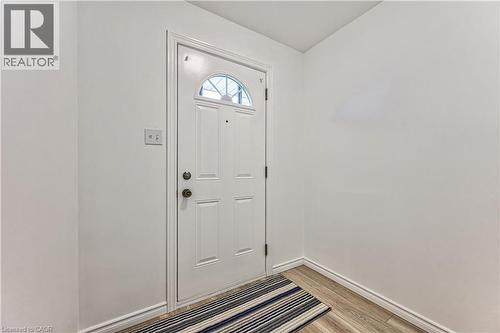 Foyer entry with guest closet - 21 Vicmount Drive, Kitchener, ON 