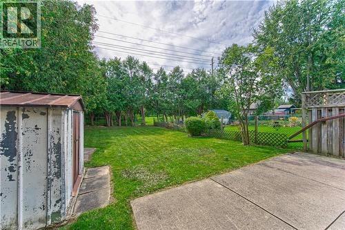 Deep fenced yard with no neighbours behind. - 21 Vicmount Drive, Kitchener, ON 