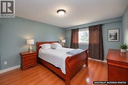 Primary bedroom -upper floor.  photo has been digitally altered - 