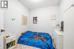 Neutral wall color, wall-to-wall carpeting, and a built-in wardrobe - 