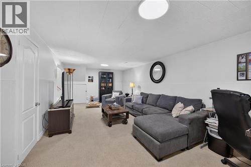 Recessed lighting, wall paneling, and neutral carpet flooring - 1434 Dewbourne Crescent, Burlington, ON 