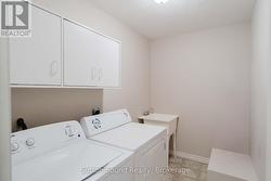 Mainfloor Laundry with Laundry Sink/Storage - 