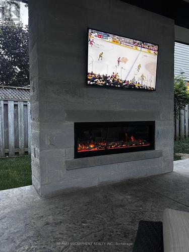 Enjoy entertaining around your fireplace and TV - 4014 Jarvis Crescent, Burlington, ON 