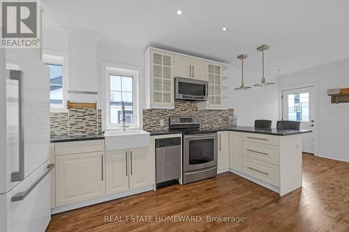 57 VALHALLA BOULEVARD , Toronto, Ontario M1N 3B4 3