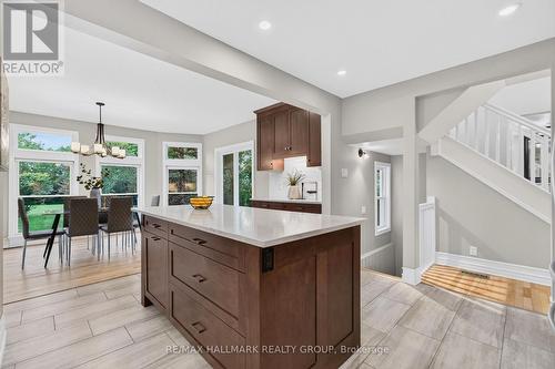 Open to dining room with floor to ceiling windows! - 1608 Prince Of Wales Drive, Ottawa, ON 