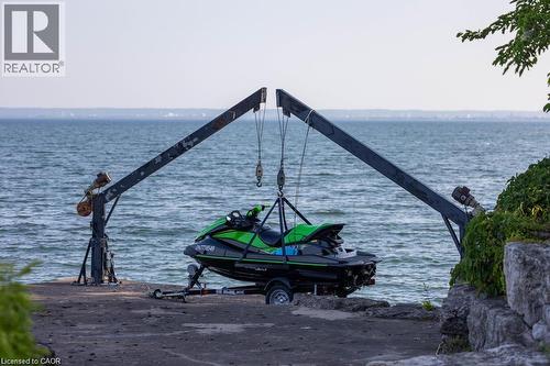 Waterfront access with marine lift system and concrete dock - 4038 Lakeshore Road, Burlington, ON 