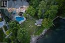 Stately multi-story residence with a complex roofline - 4038 Lakeshore Road, Burlington, ON 
