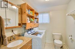 Laundry + 2pc bathroom on lower level - 