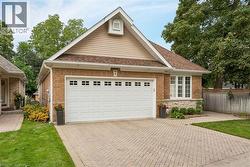 Brick exterior with a peaked roofline - 