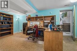 Built-in shelving, built-in desk, and a rear door with exterior access - 