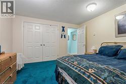 Recessed panel closet doors, ceiling-mounted light fixture, wall-mounted light fixture, and panel door - 