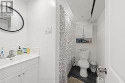 Lower level full 4pc bath w shower/tub combo. - 