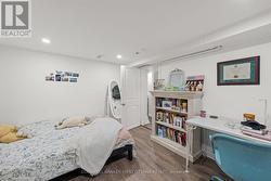 Pot lights above & space for desk. - 