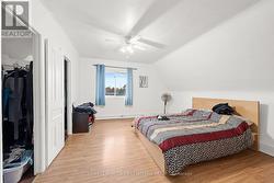 Massive bedroom w 2 dbl door closets and window. - 