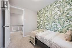 Textured wall featuring a palm frond pattern - 