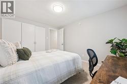 Wall-to-wall carpeting and neutral wall tones - 
