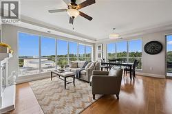 Expansive windows illuminate the open-concept living area - 
