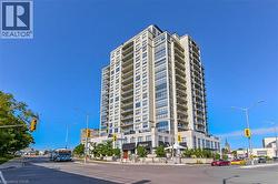 Modern multi-story building featuring extensive glazing and numerous private balconies - 