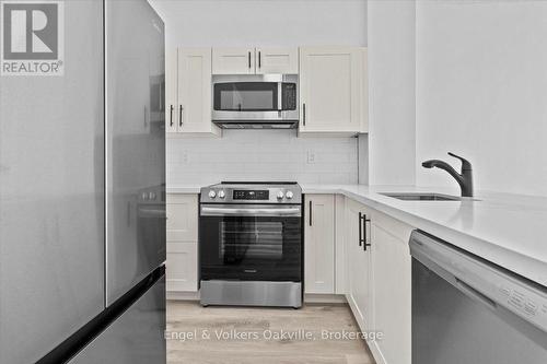 511 - 2511 LAKESHORE ROAD W , Oakville (BR Bronte), Ontario L6L 6L9 5