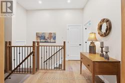 Hallway to half bath, garage and basement - 