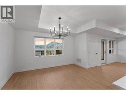 Please note photos are of Unit 107 with same kitchen colour scheme, flooring, and appliances. - 