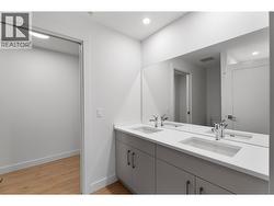 Please note photos are of Unit 107 with same kitchen colour scheme, flooring, and appliances. - 
