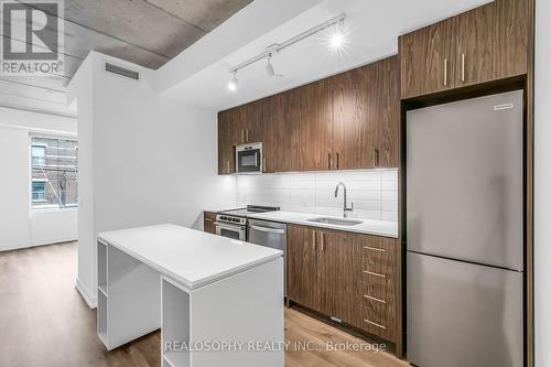 307 - 115 LARCHMOUNT AVENUE , Toronto, Ontario M4M 2Y6 3