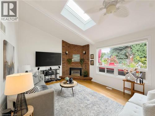 Vaulted ceiling with skylight and ceiling fan - 1236 Thorpe Road, Burlington, ON 