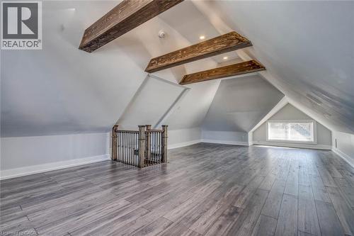 Vaulted ceilings with exposed wood beams and recessed lighting - 23 Gibson Avenue, Hamilton, ON 