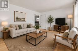 Apt 2 Main Level - Living Room (Virtually Staged) - 