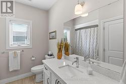 LARGE 4 PC MAIN FLOOR BATH WITH LAUNDRY CLOSET - 
