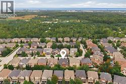 Residential neighborhood with varied architectural styles and mature landscaping - 