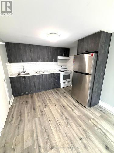 4 - 11 DONALD AVENUE , Toronto, Ontario M6M 1J7 2