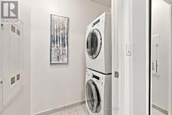 Separate laundry area w storage - 
