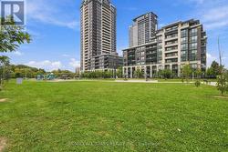 Ample greenspace & trails surrounding the building - 