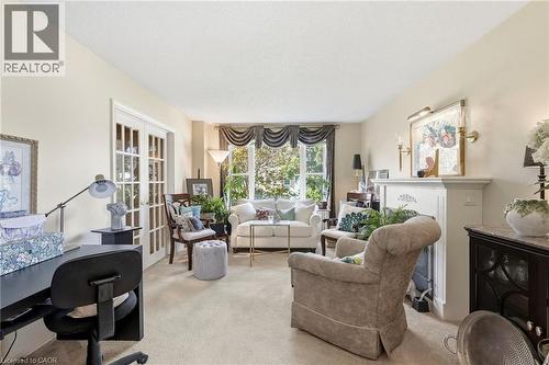French doors, expansive window, built-in fireplace - 89 Brigade Drive, Hamilton, ON 