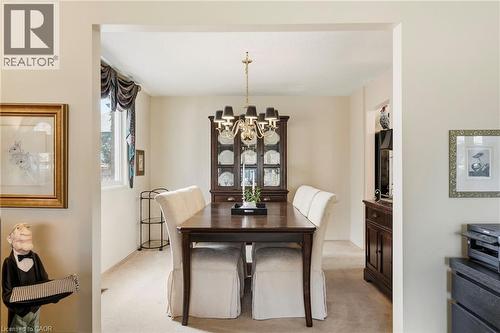 dining area with a chandelier - 89 Brigade Drive, Hamilton, ON 