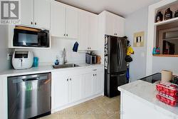 Upper Unit Kitchen - 