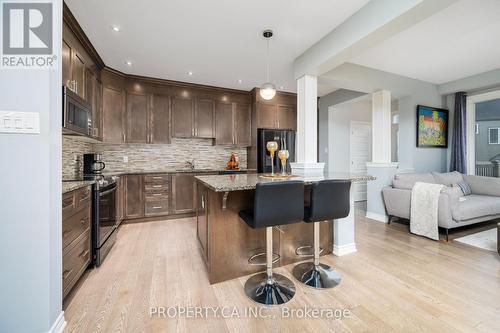 Sleek kitchen, quartz island - 125 Sweetvalley Drive, Ottawa, ON 