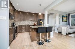 Sleek kitchen, quartz island - 