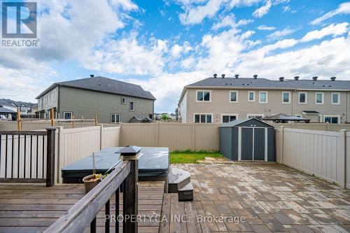 Backyard oasis with hot tub - 125 Sweetvalley Drive, Ottawa, ON 