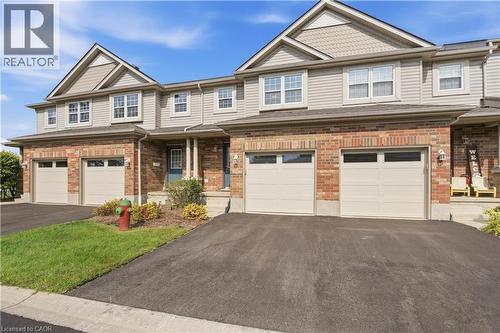 Brick and siding exterior with multiple gables - 30 S Imperial Road Unit# 3, Guelph, ON 
