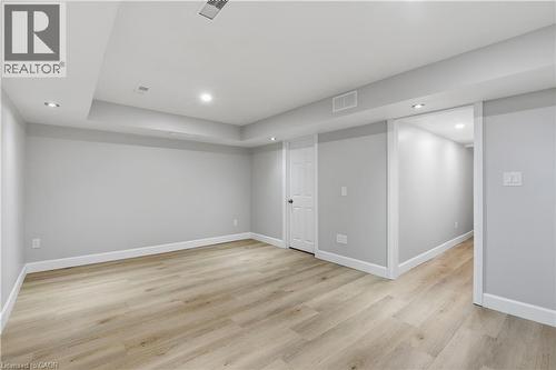 Recessed lighting, light wood-finish flooring, white trim, and a white interior door - 30 S Imperial Road Unit# 3, Guelph, ON 