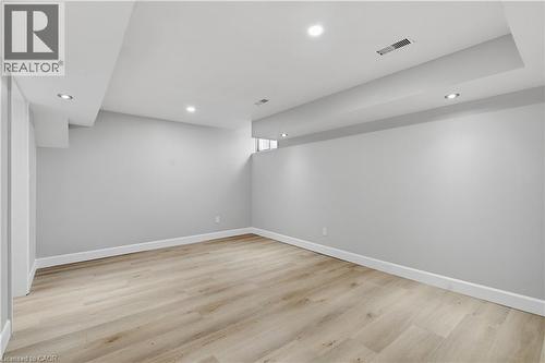 Recessed ceiling lights, light wood-finish flooring, white baseboards, and neutral wall paint - 30 S Imperial Road Unit# 3, Guelph, ON 