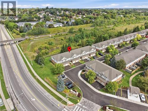 Townhome community featuring private driveways, paved roadways, and landscaped grounds - 30 S Imperial Road Unit# 3, Guelph, ON 