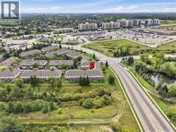 Townhome community with mature landscaping and paved roadways - 