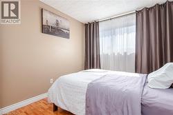 Wood-finish flooring with neutral wall paint - 