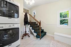 Side entry with stairway to locked suites - 