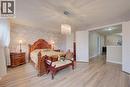 Two-story residence featuring brick and stone cladding, dual garage doors, a covered entry porch, and a stepped pathway - 78 Stuckey Avenue, Baden, ON 